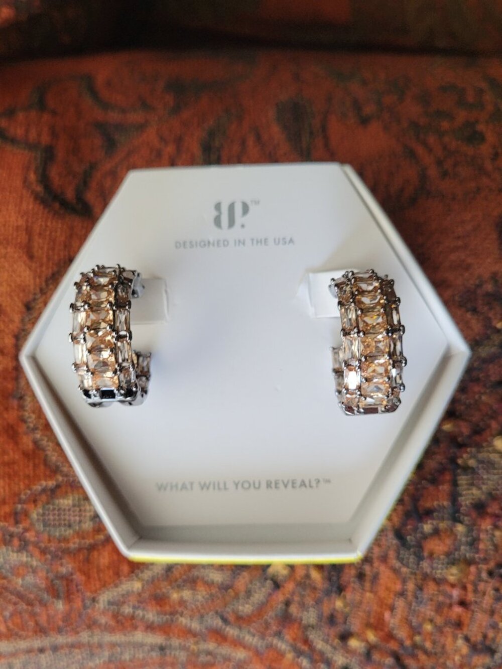 Gorgeous Peach color smokey topaz and diamond cz earrings set in hematite